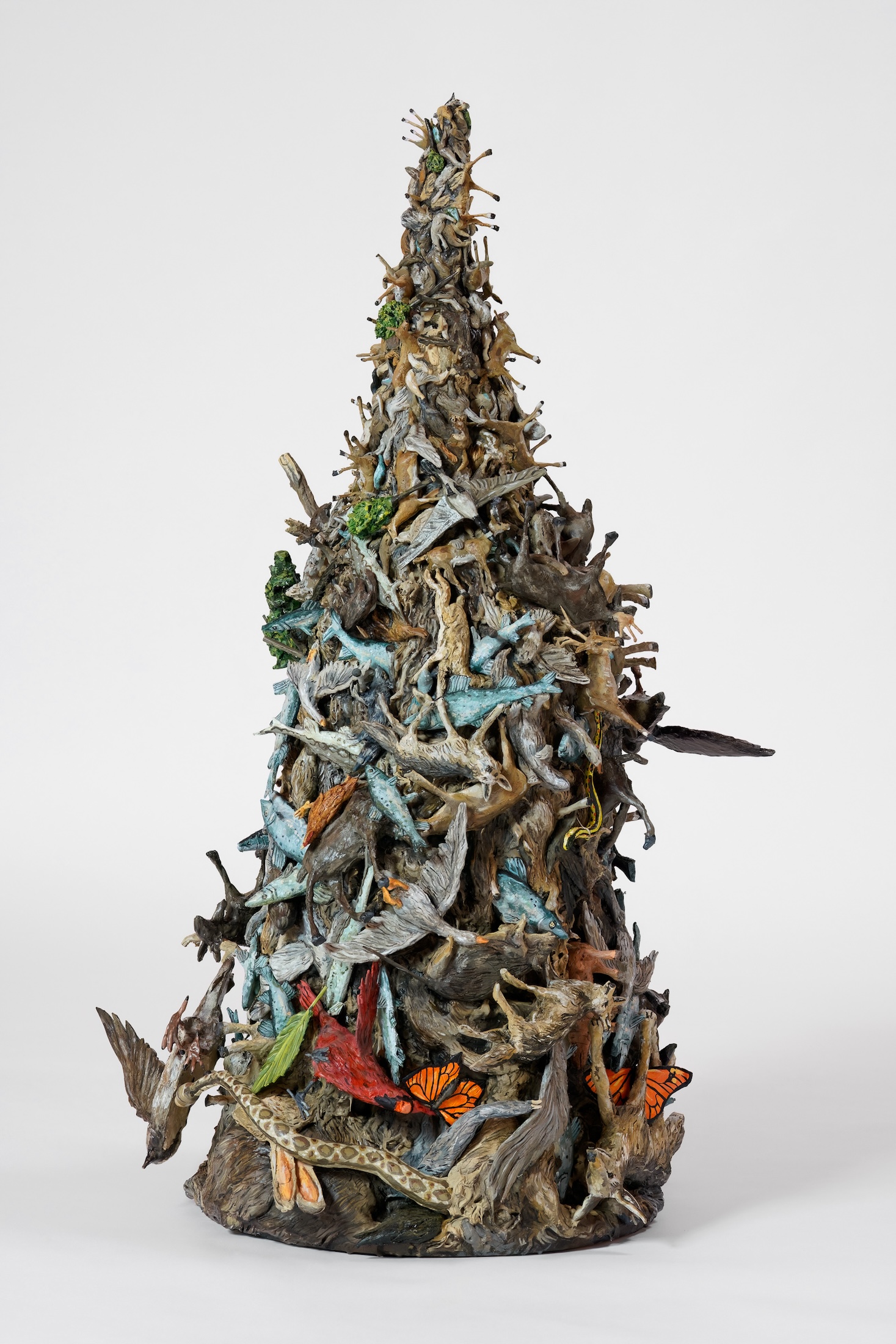 Sculpture of a stacked pile of animal bodies and natural elements