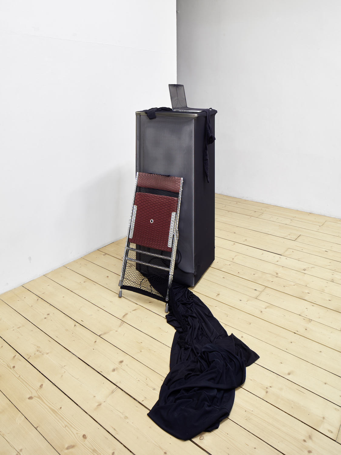 Textile, fridge, stockings, Macbook, chair. Photo by Edward Greiner