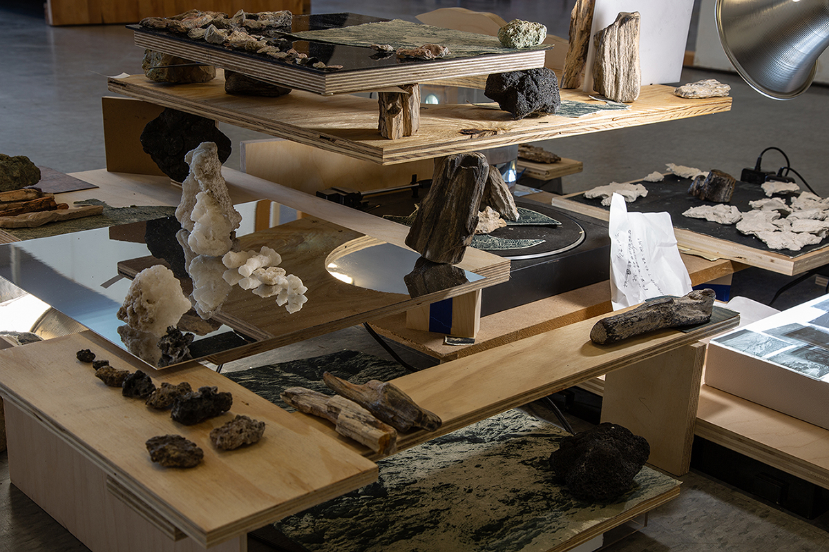 With the whole work's structure supported by salvaged rocks and plywood scraps, we explore how a construction of the fragmented brings the multitude of functionalities, identities, and meanings together, and us into proximity with such process.