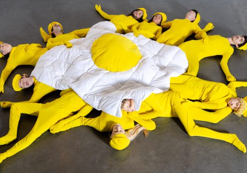 11 performers as French fries sleep under a fried-egg-shaped duvet every day for the duration of ArteBa art fair.