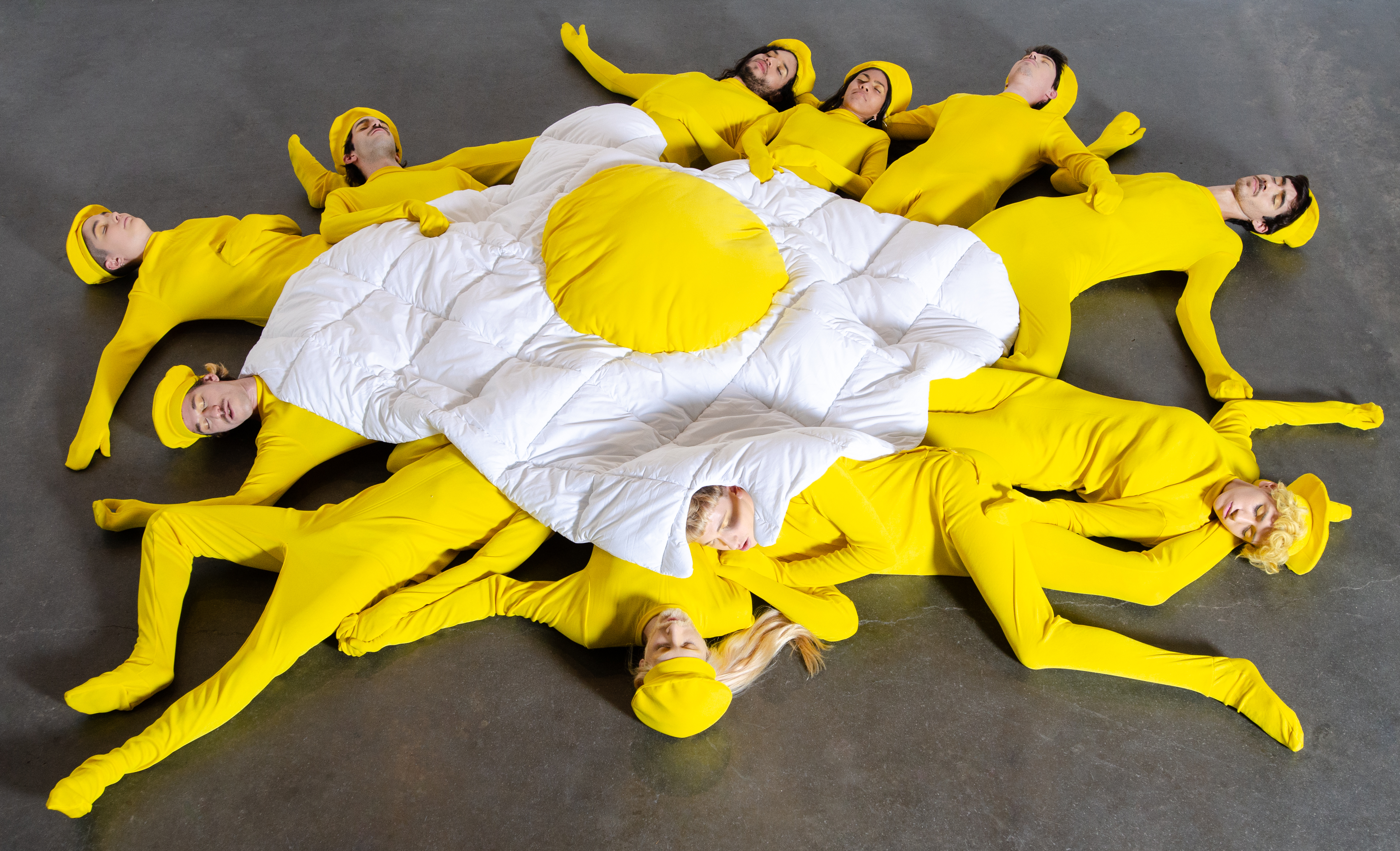 11 performers as French fries sleep under a fried-egg-shaped duvet every day for the duration of ArteBa art fair.