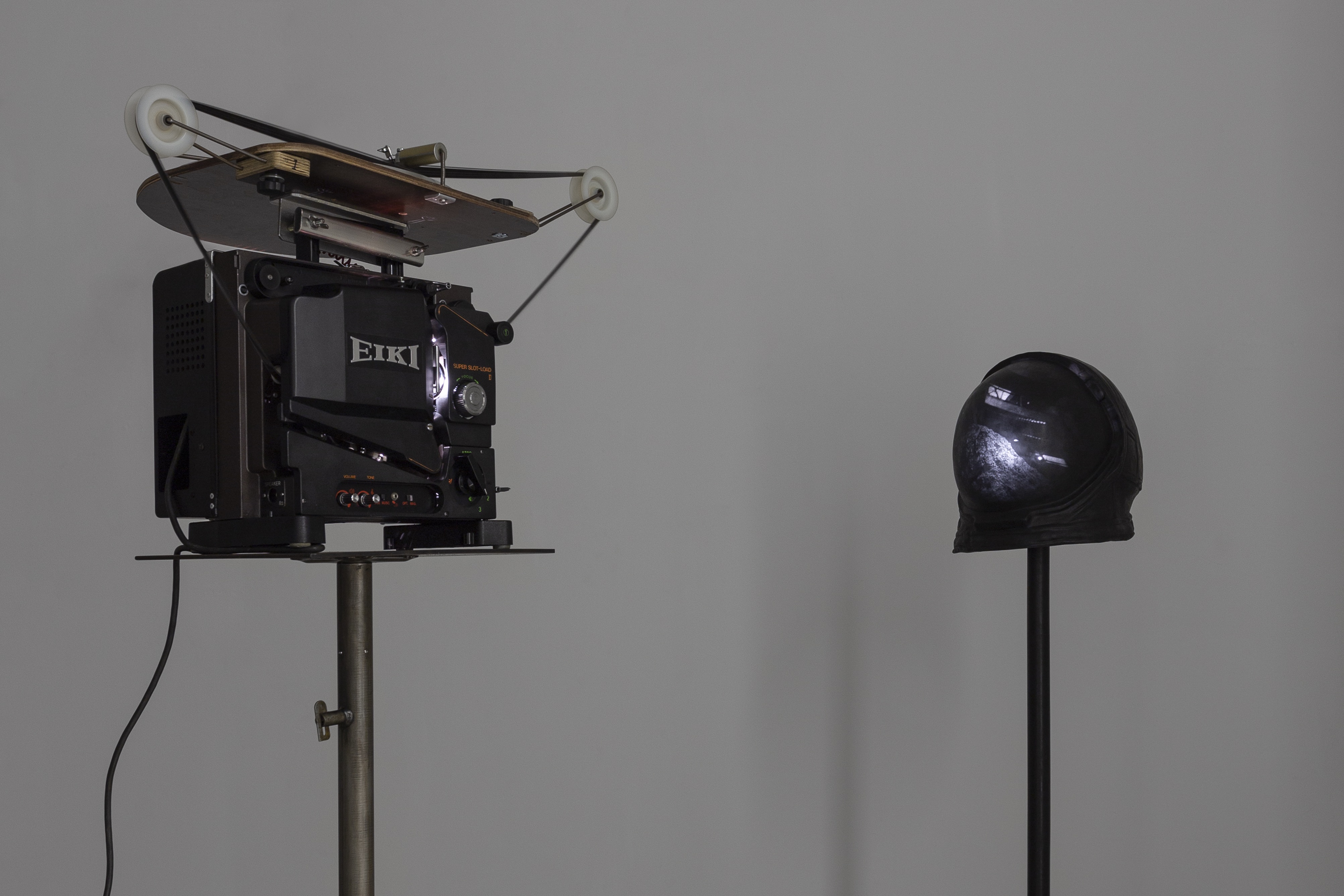 BRONZE, IRON, STEEL, WOOD, 16MM FILM PROJECTOR, LOOPER, 16MM FILM (B/W, SILENT, 2’25”, LOOP) VARIABLE DIMENSIONS INSTALLATION VIEW, ‘SEA OF TRANQUILITY’, FRAME SECTION AT FRIEZE NY AT THE SHED, NEW YORK