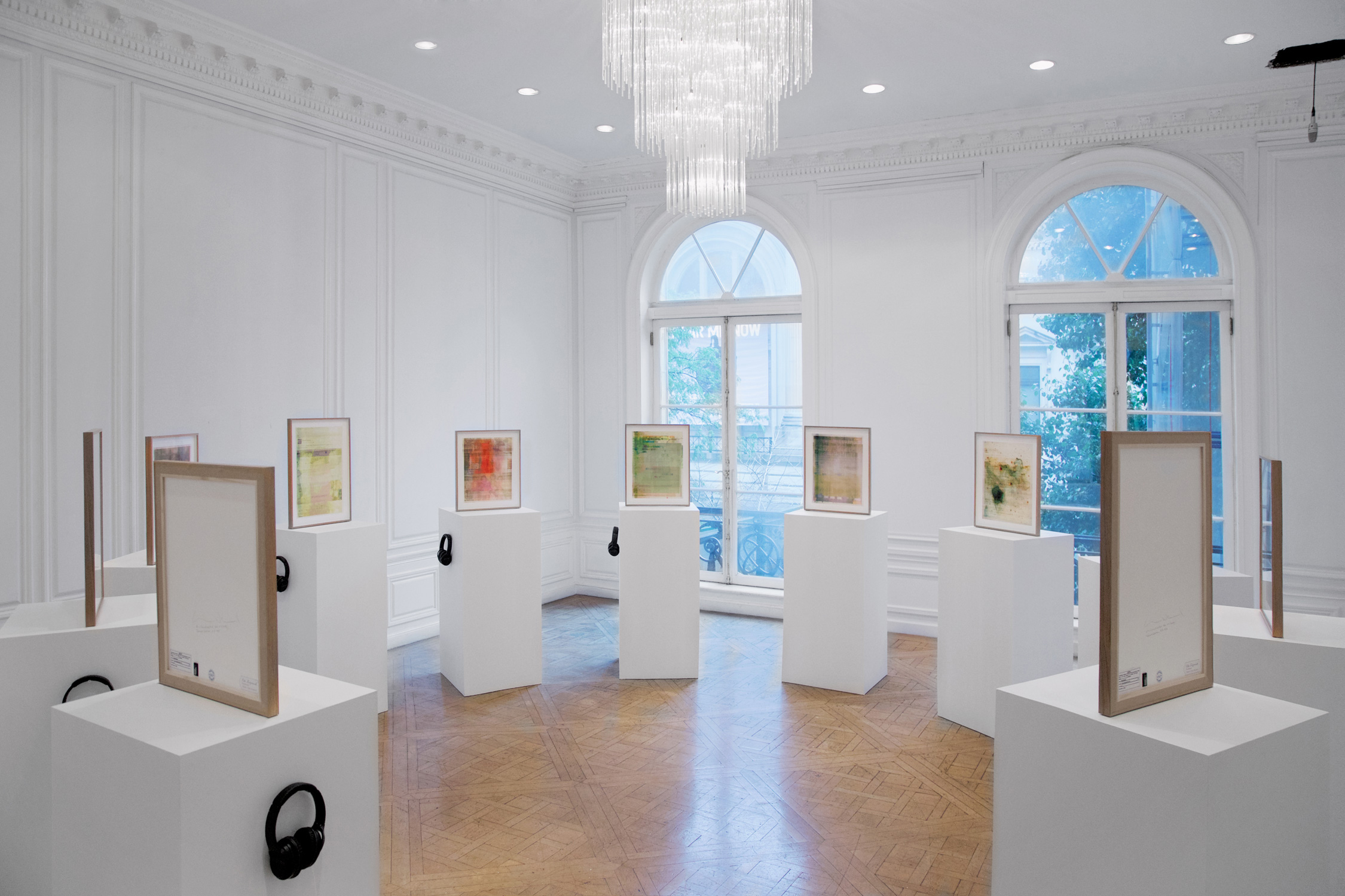 Installation view of exhibition with paintings facing each other in a circle in the middle of a room. In situ at the exhibition “Elias Wessel—It's Complicated, Is Possibly Art;” 1014 New York, 2022