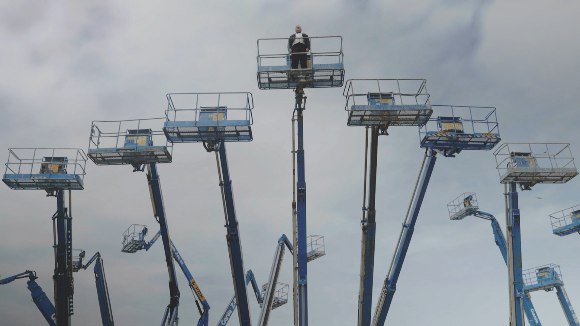 A short video work, which presents an opera singer, standing on a lifted platform and singing a Martyr's wish for redemption.