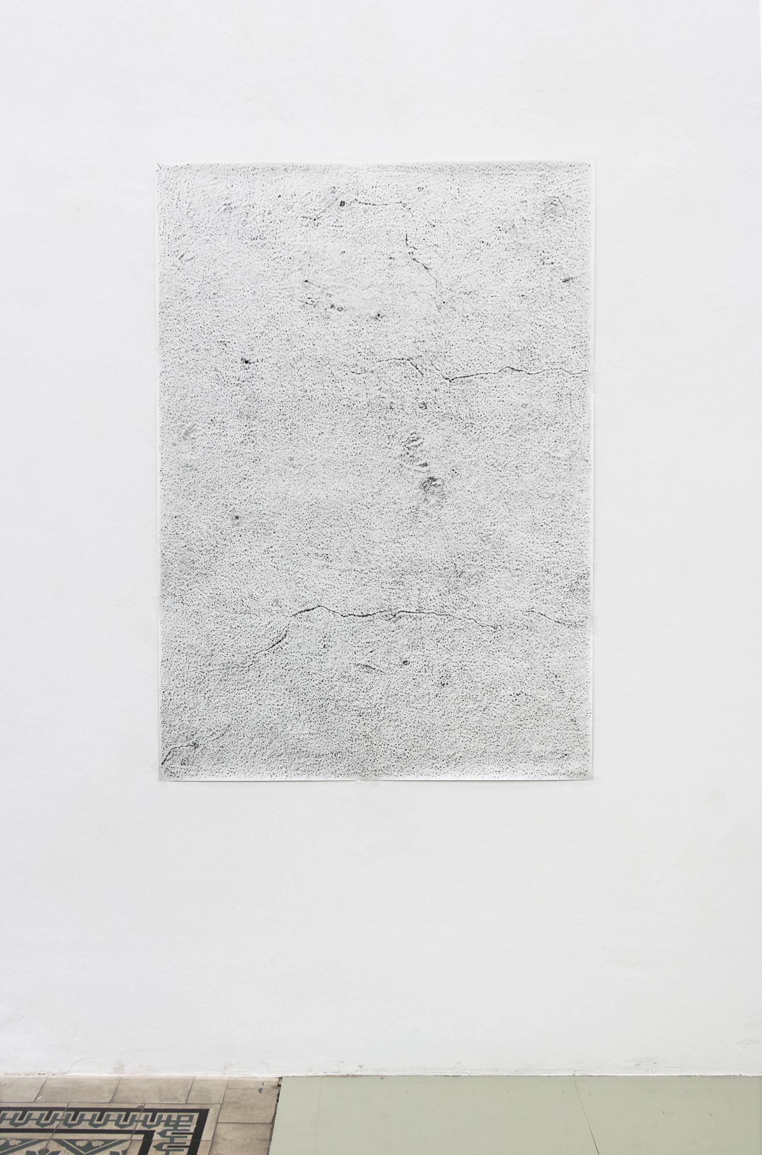 The surface of the wall in exhibition spaces is traced onto large paper, making the white background of the architecture subject of what is being seen.