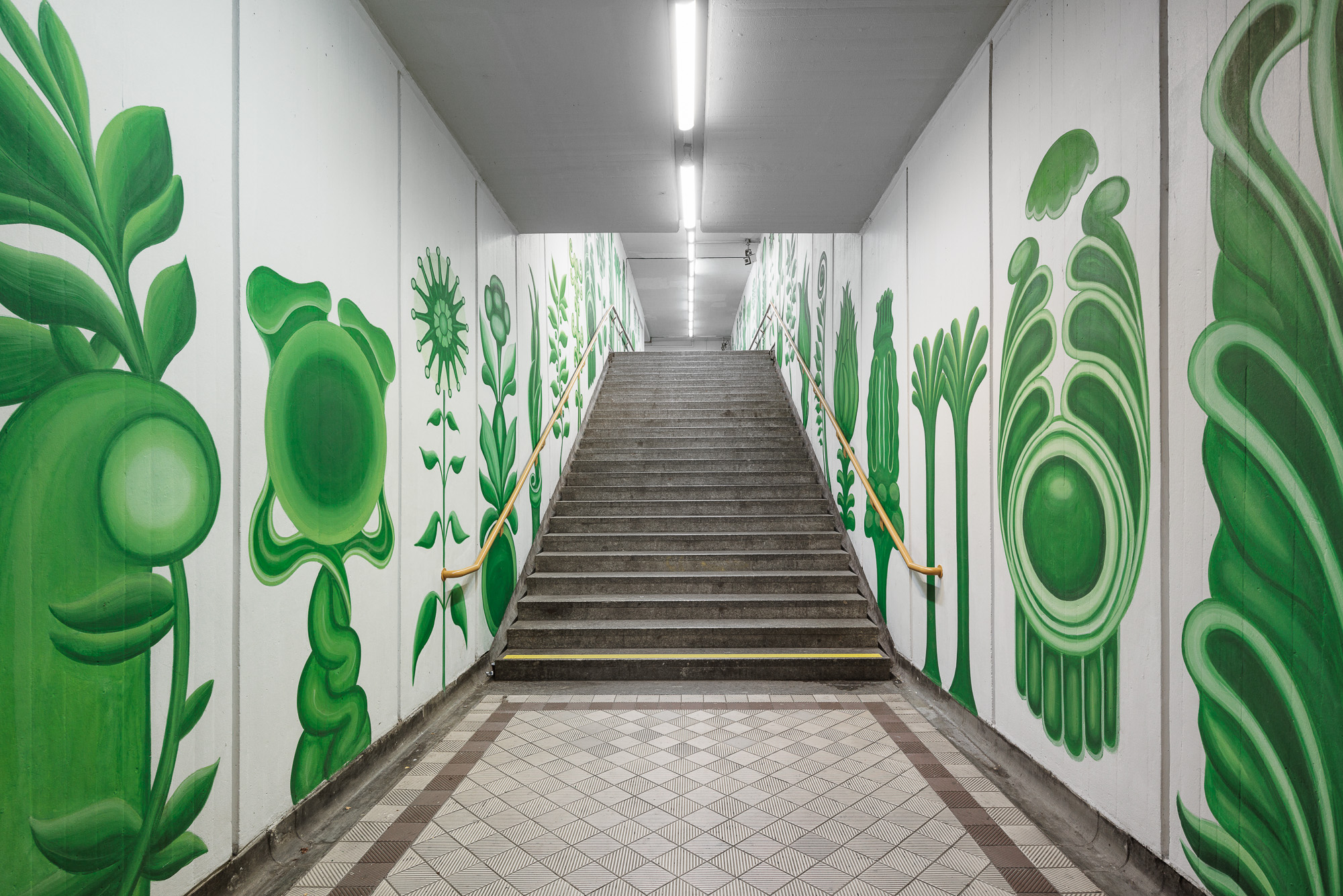 An image of a large mural in an underground station in Vienna.