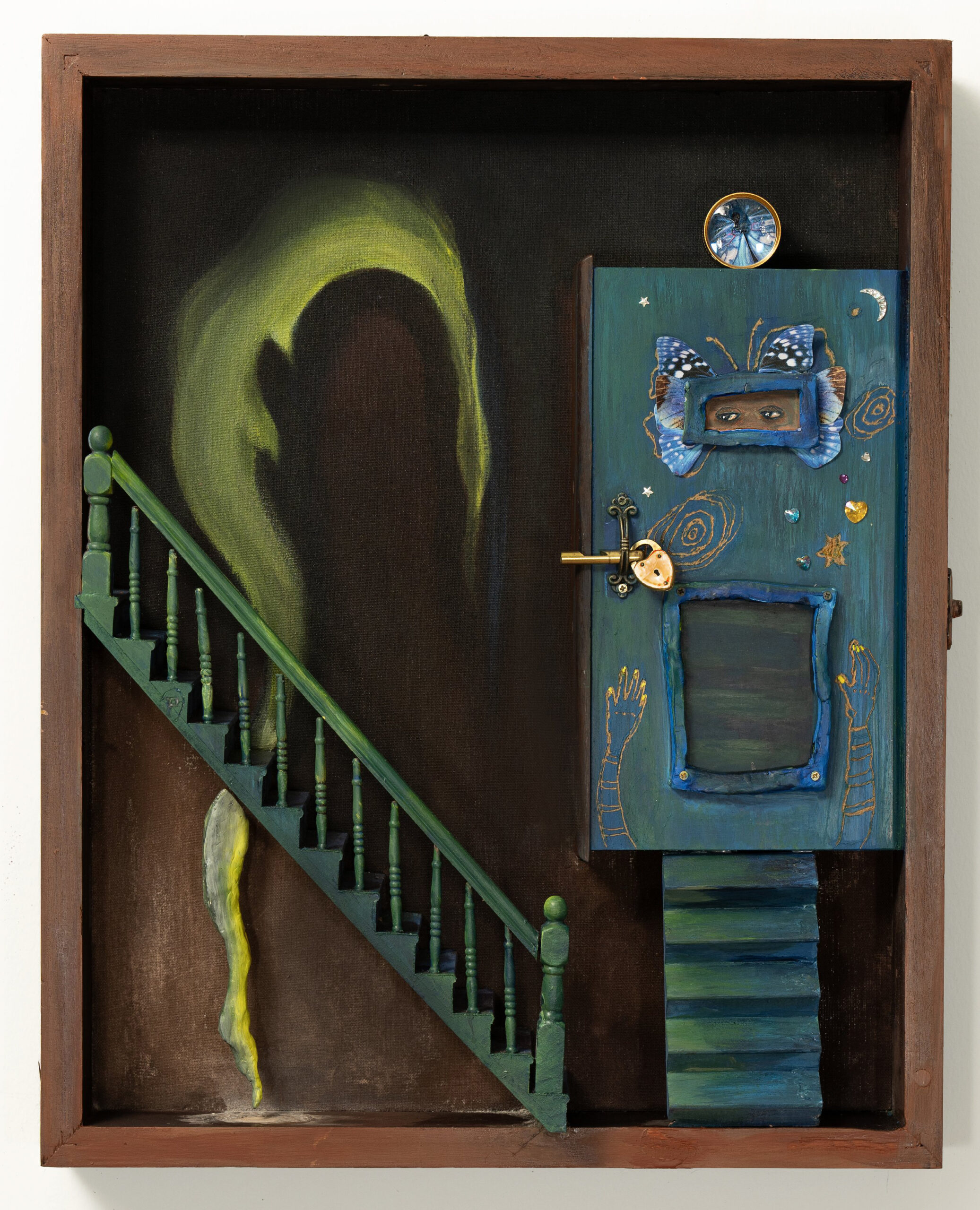 Shadow box artwork featuring a mysterious staircase painted green, leading to a blue door adorned with butterfly motifs, eyes, and golden accents. A faint, glowing silhouette emerges in the dark background, evoking an eerie presence. Below the stairs, a yellow and gray dripping form adds a surreal touch.