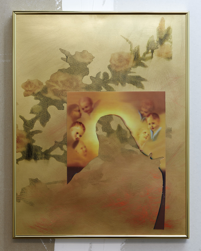 A framed artwork consisting of thin golden frame containing a predominantly gold spraypainted ground with faded rose branches rendered on the surface, giving way to an ethereal fluorescent orrange area toward the bottom right corner. A yellow and orange religious lenticular print with angels in the background with a figure physically cut out is adhered on top on the spraypainted ground.