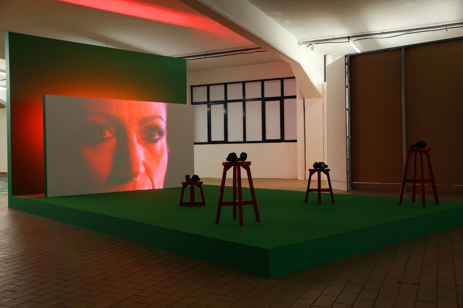 video, neon light, tube light, wood, carpet, paint. Curated by Daniella Géo