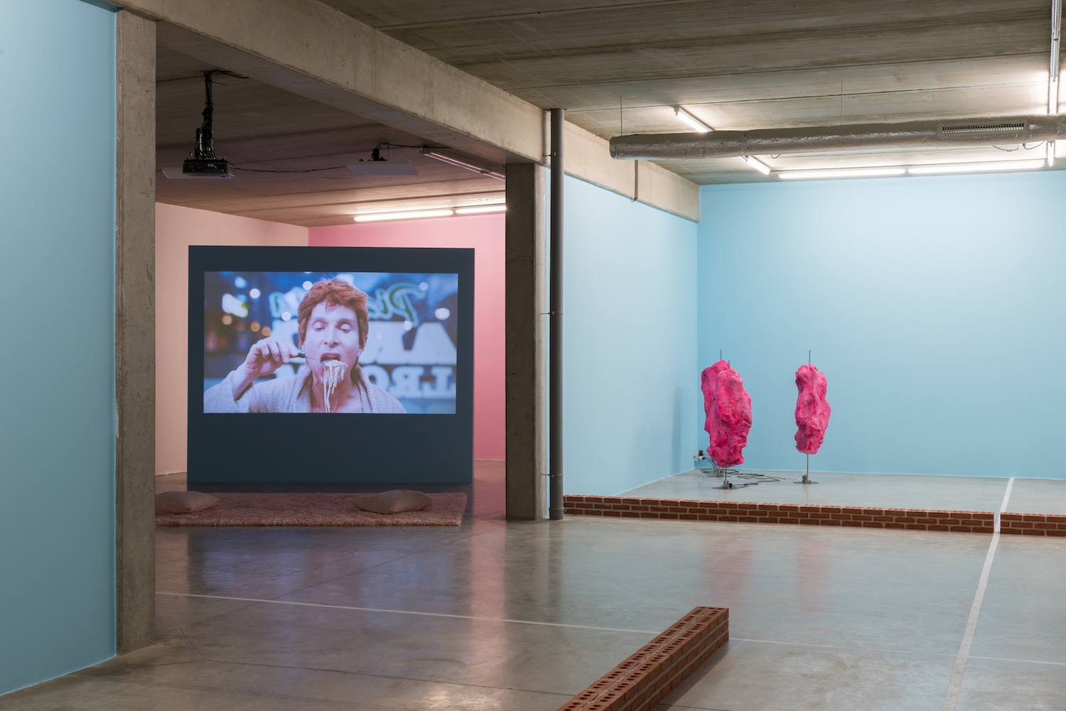 video, brick, vinyl, electric motors, papier-mâché, steel, paint. Curated by Brenda Guesnet.